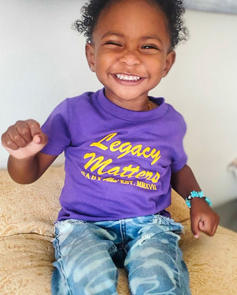 Baby Alum Exclusive:  Legacy Matters T-Shirt (Purple & Gold)